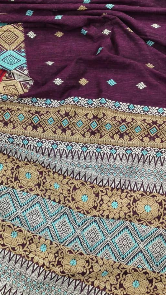 Confident Indian woman draped in pure Eri silk handloom saree, structured yet fluid drape, traditional Assam weave