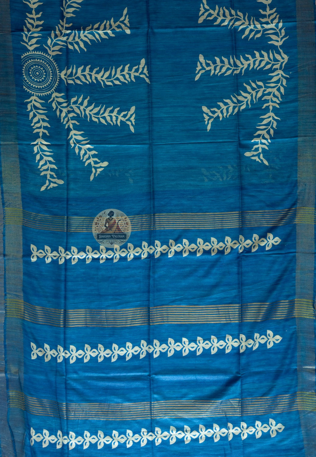 Full view of Ghicha Tussar Silk Saree laid flat showcasing complete handwoven wild forest silk fabric in earthy golden-brown, a saree worn with intention for Durga Puja, Diwali, Teej and every meaningful occasion