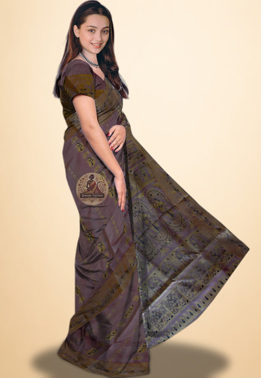 Close-up of Mahabharata scene handwoven into Baluchari silk saree pallu — Bengal heritage craft