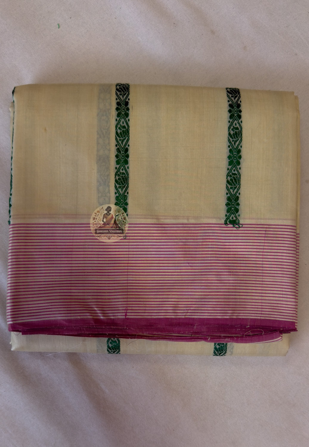Full flat lay of West Bengal Tussar silk saree in autumn harvest gold showing woven geometric lattice border and wild silk body texture — Dakshin Vastram
