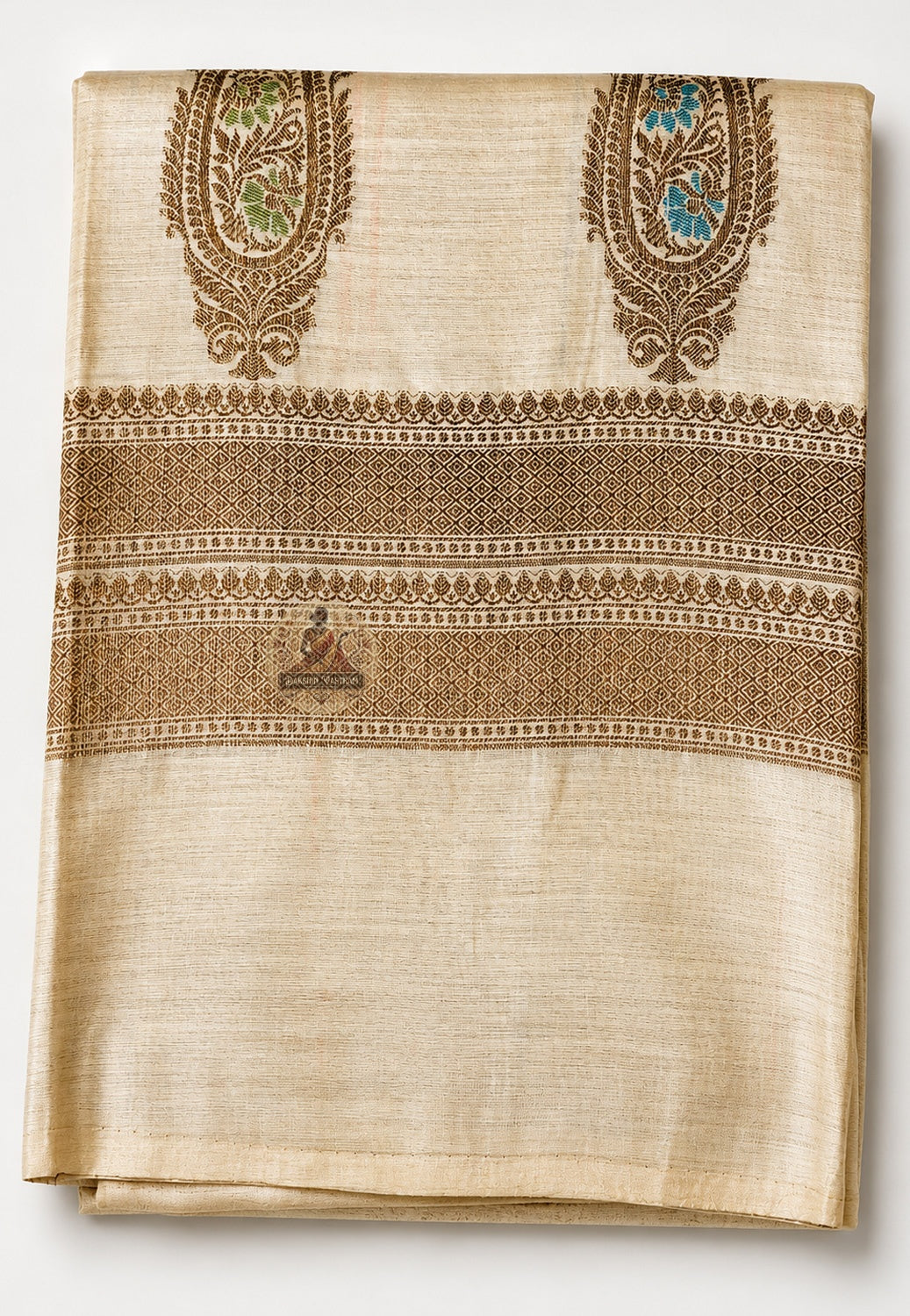 Detailed close-up of Banarasi pallu on Muga Tussar Saree with intricate handwoven zari buti and floral border — crafted on traditional Varanasi looms