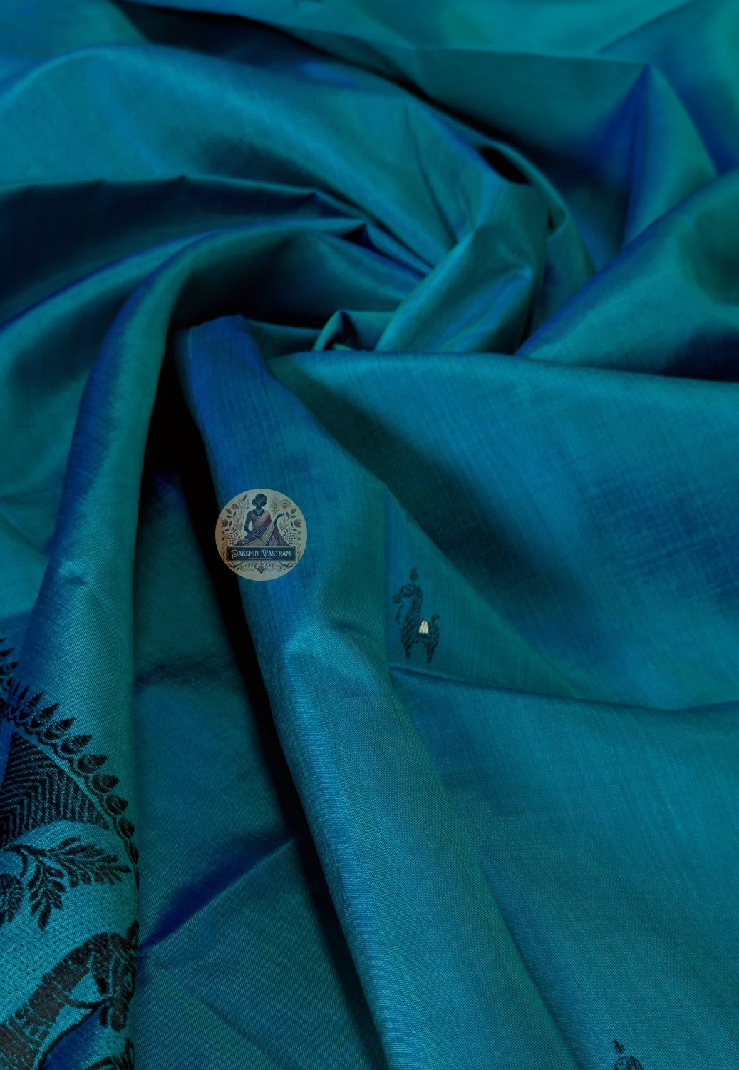 Flat lay of authentic Baluchari pure silk stole in rich jewel tones – handcrafted in West Bengal, India