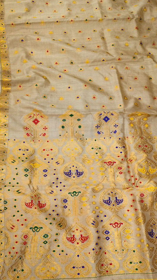 Rare Muga silk saree in deep amber-gold full drape, handwoven from wild Assam forest silk — Dakshin Vastram heirloom collection