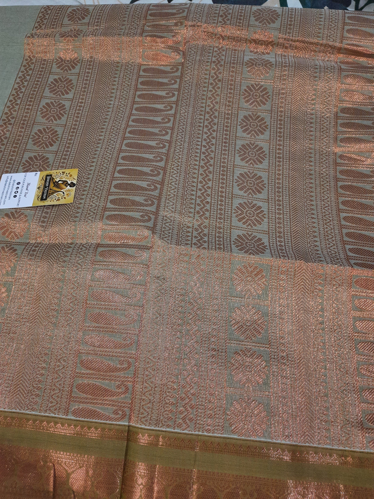 Rear view of Handloom Organic Cotton with Copper Zari, emphasizing smoothness and eco-friendly design
