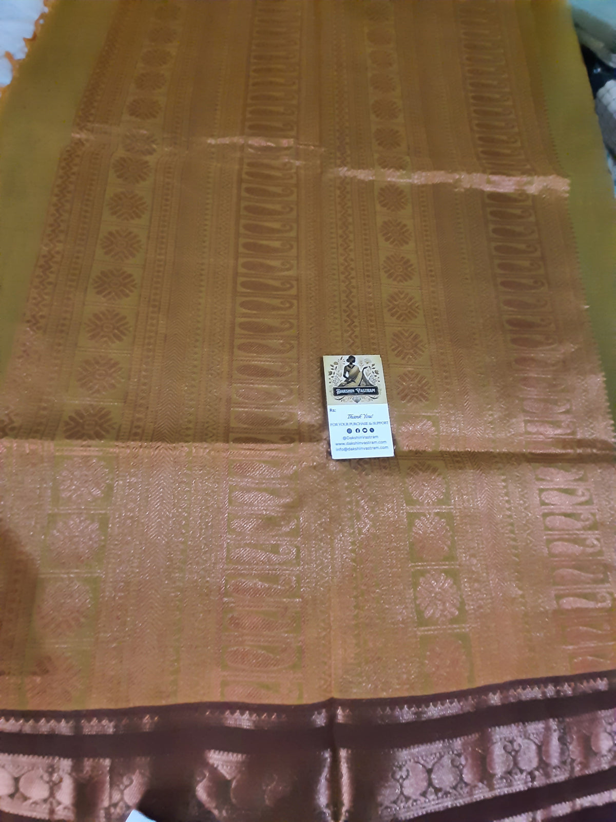 Side view of Handloom Copper Zari fabric showcasing eco-friendly craftsmanship and texture
