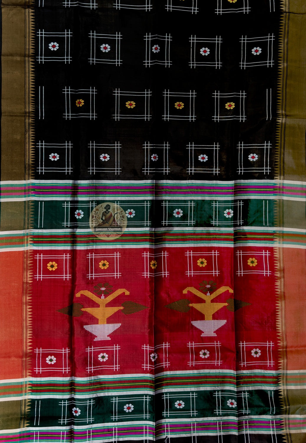 Close-up of Bishnupur Katan silk festive saree weave showing tightly woven pure silk texture and traditional Bengal buti motifs formed in the weave