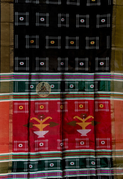 Close-up of Bishnupur Katan silk festive saree weave showing tightly woven pure silk texture and traditional Bengal buti motifs formed in the weave