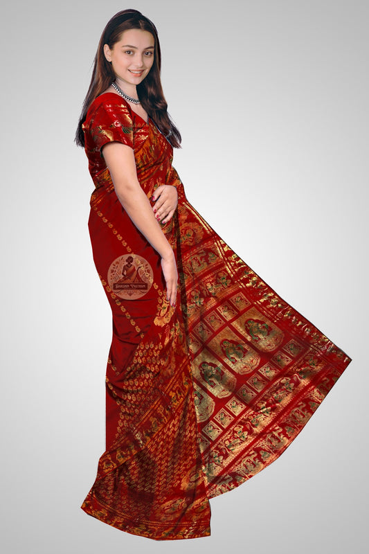 Close-up of handwoven Swarnachari zari pallu with traditional Bengal golden motifs