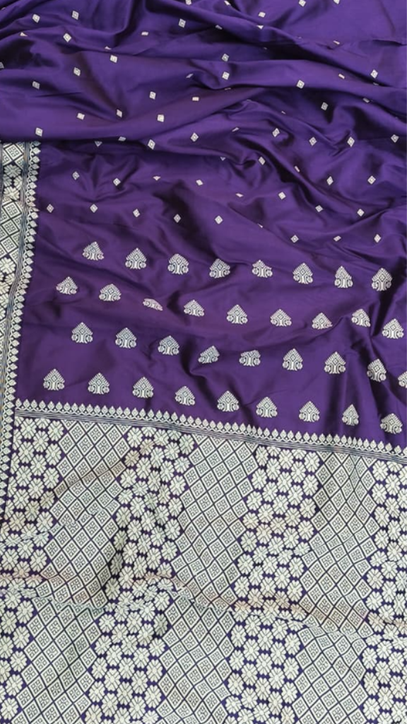 Indian woman wearing Assam Mulberry Silk Saree in classic Nivi drape, perfect for weddings and celebrations in London and Birmingham