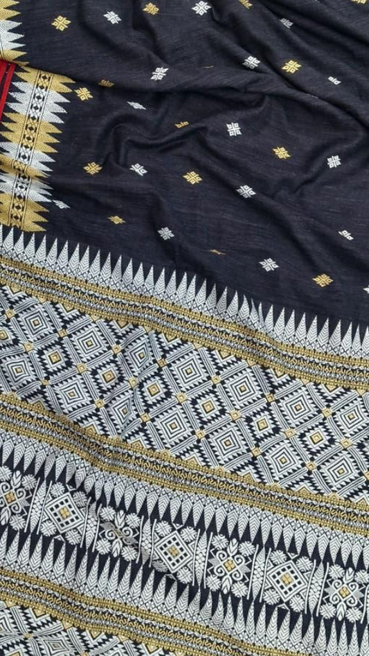 Detailed close-up of hand-spun Eri silk fabric from Assam showing dense handloom weave and natural cotton-like texture