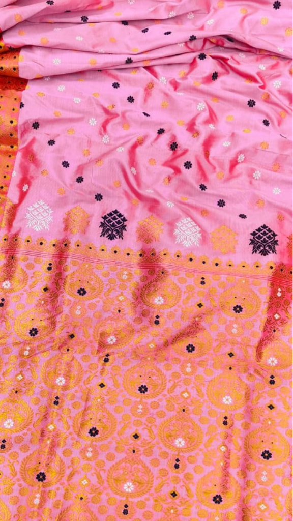 Indian woman wearing an Assam Mulberry Silk Saree at a South Asian wedding — elegant ethnic wear for UK occasions