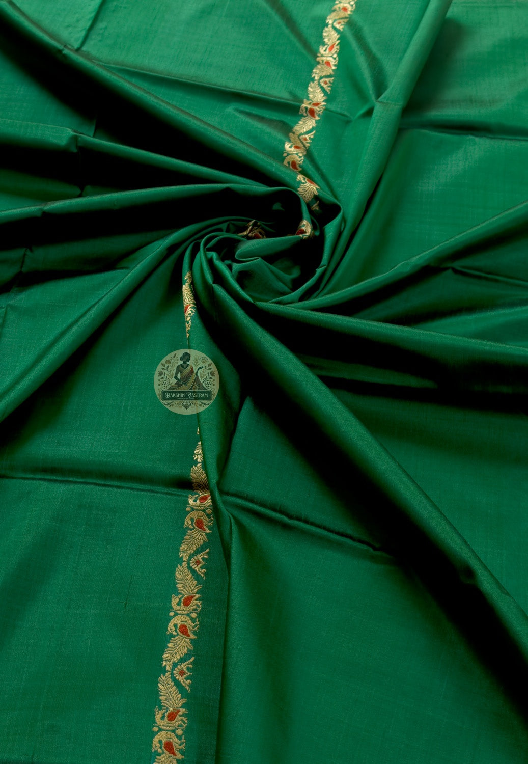 Close-up of Bishnupur Baluchari silk stole weave showing master weaver narrative figures and geometric border formed thread by thread in pure silk
