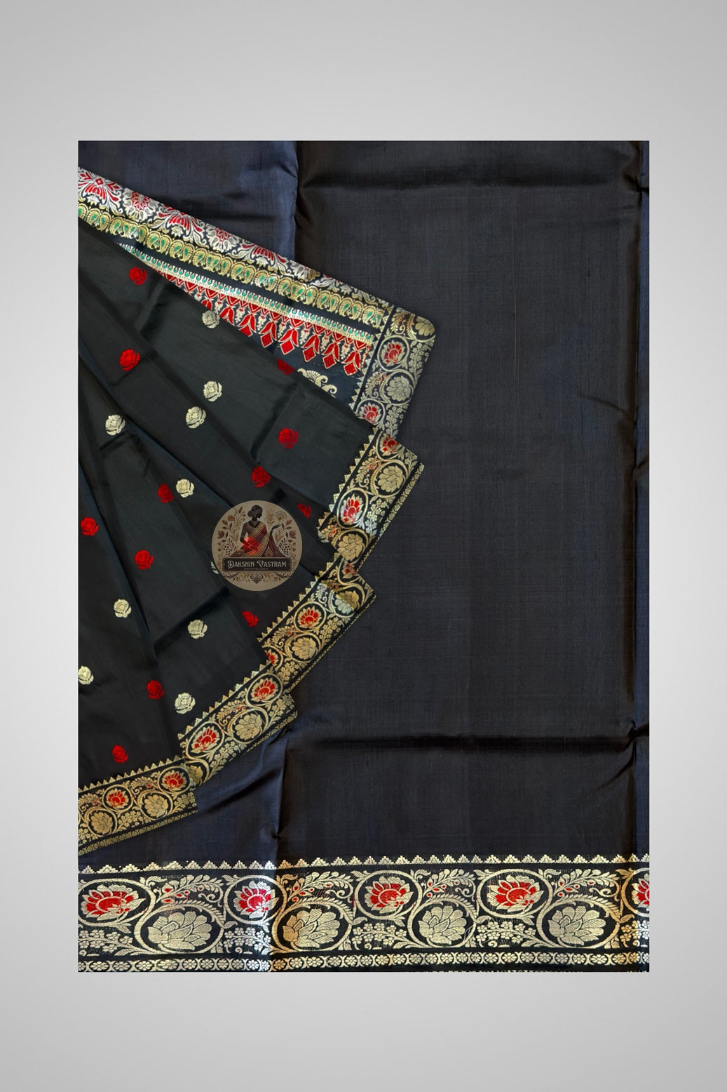 Traditional handloom Baluchari saree in terracotta with hand-woven narrative motifs and ivory contrast pallu