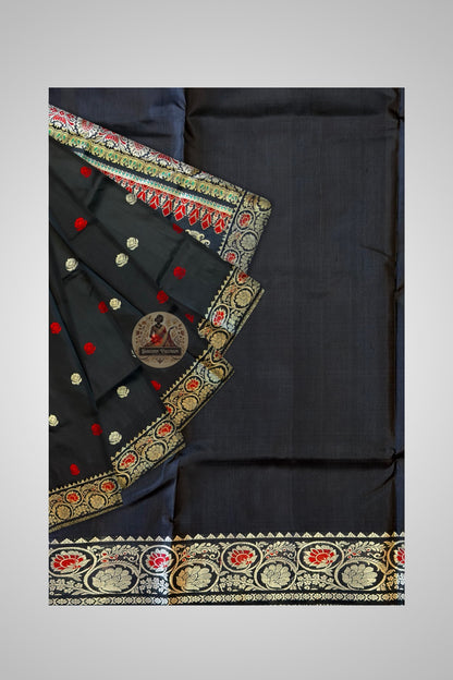 Traditional handloom Baluchari saree in terracotta with hand-woven narrative motifs and ivory contrast pallu