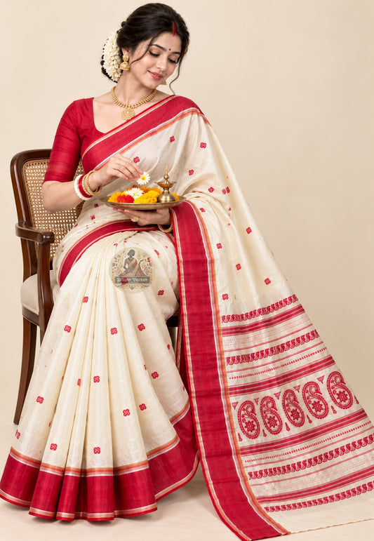 Front view of Bishnupur Garad silk saree showing natural ivory silk drape and traditional Bengal border motifs for Bengali wedding ceremonies