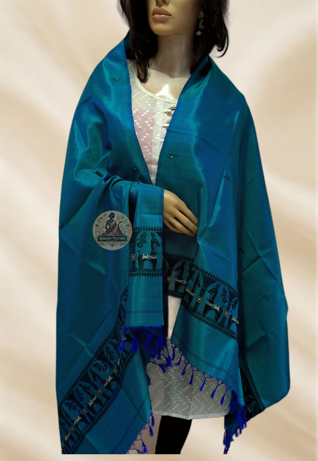 Close-up of Baluchari silk stole showing hand-woven storytelling motifs in pure mulberry silk