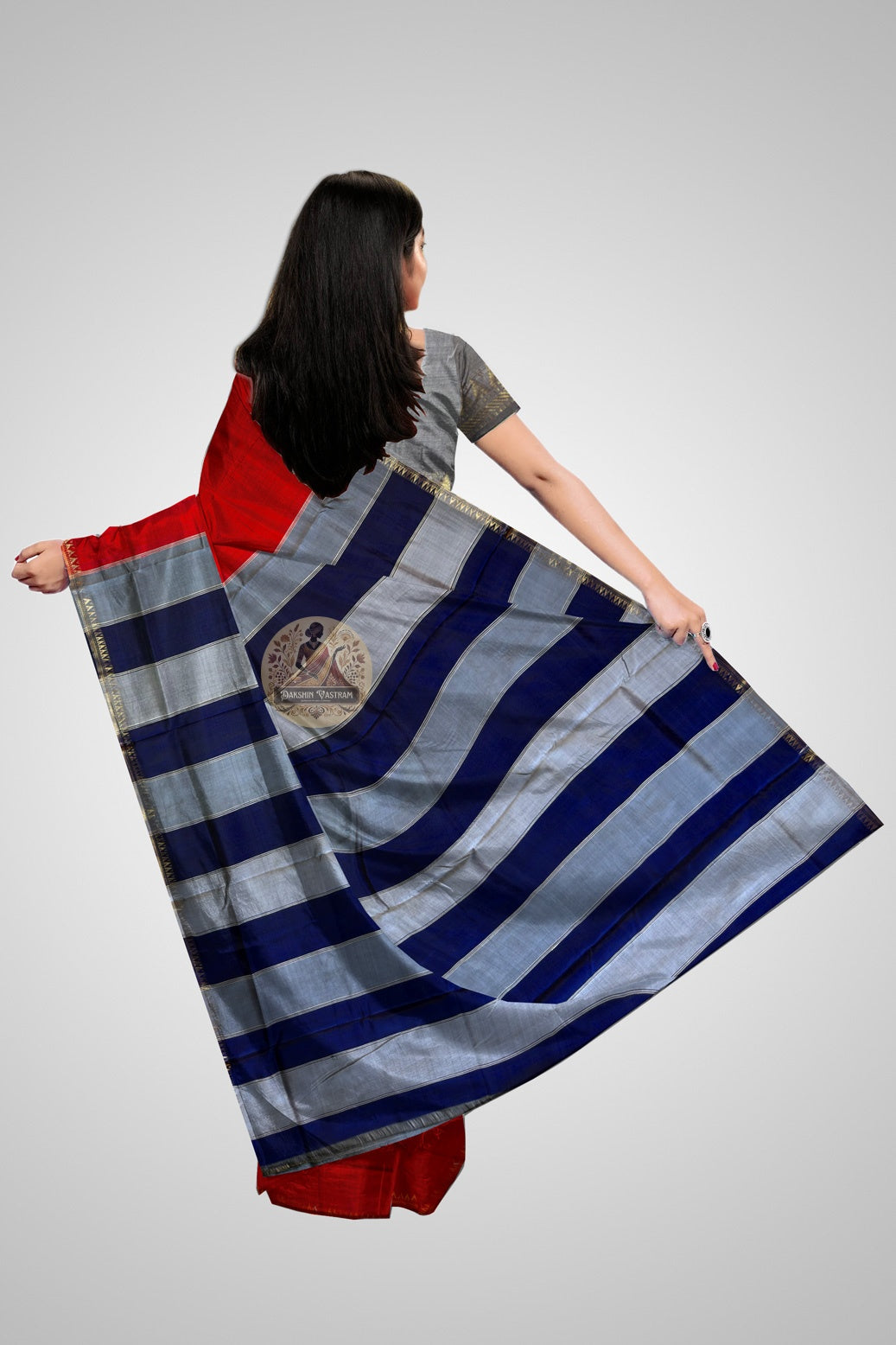 Close-up of Bishnupuri Katan silk weave texture showing rich sheen and intricate craftsmanship