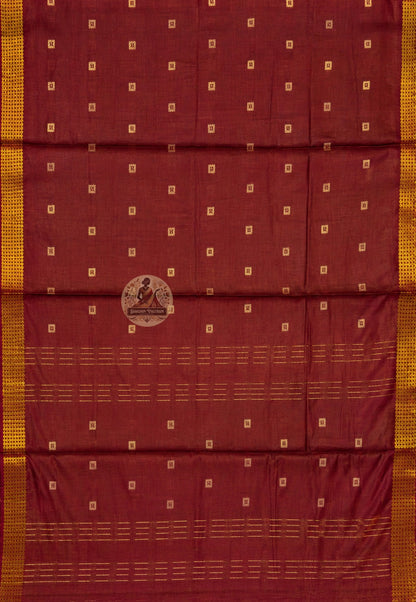 Indian woman draped in fine pure cotton handloom saree for a Diwali celebration, styled with traditional gold jewellery and bindi