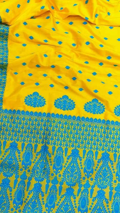 Close-up of handwoven pure mulberry silk texture from Assam Silk Saree, revealing the fine plain weave, natural sheen, and artisan craftsmanship of Northeast India