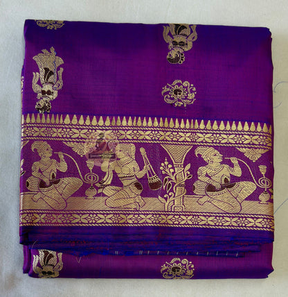 Traditional handloom Baluchari saree in fawn beige with hand-woven narrative motifs and burgundy contrast pallu