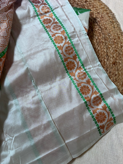 Front view of woman wearing Paat Mekhela Chador with silk blouse Rongali Bihu cultural gala Assamese wedding authentic Assam handloom
