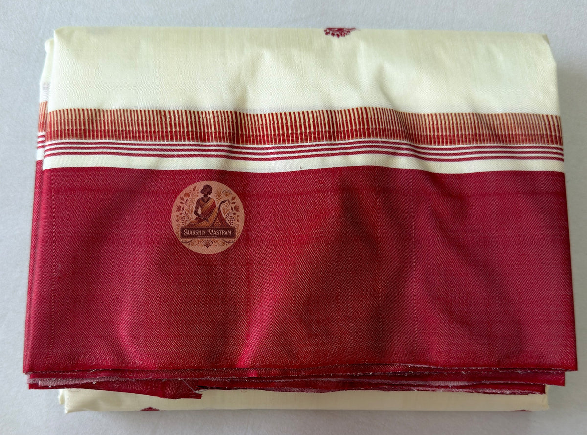 Folded Bishnupur Garad pure ivory mulberry silk saree – natural undyed glow of Bengal's most beloved auspicious handloom, ethically sourced by Dakshin Vastram, ships to India, UK, USA and EU