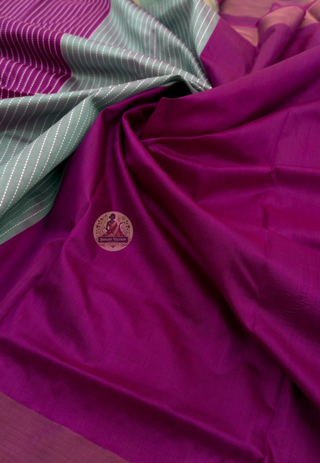 Close-up of handwoven motifs on Bishnupur Pure Katan Silk Saree, revealing intricate lotus, peacock, and temple-inspired patterns woven directly into pure Katan silk from Bishnupur, West Bengal