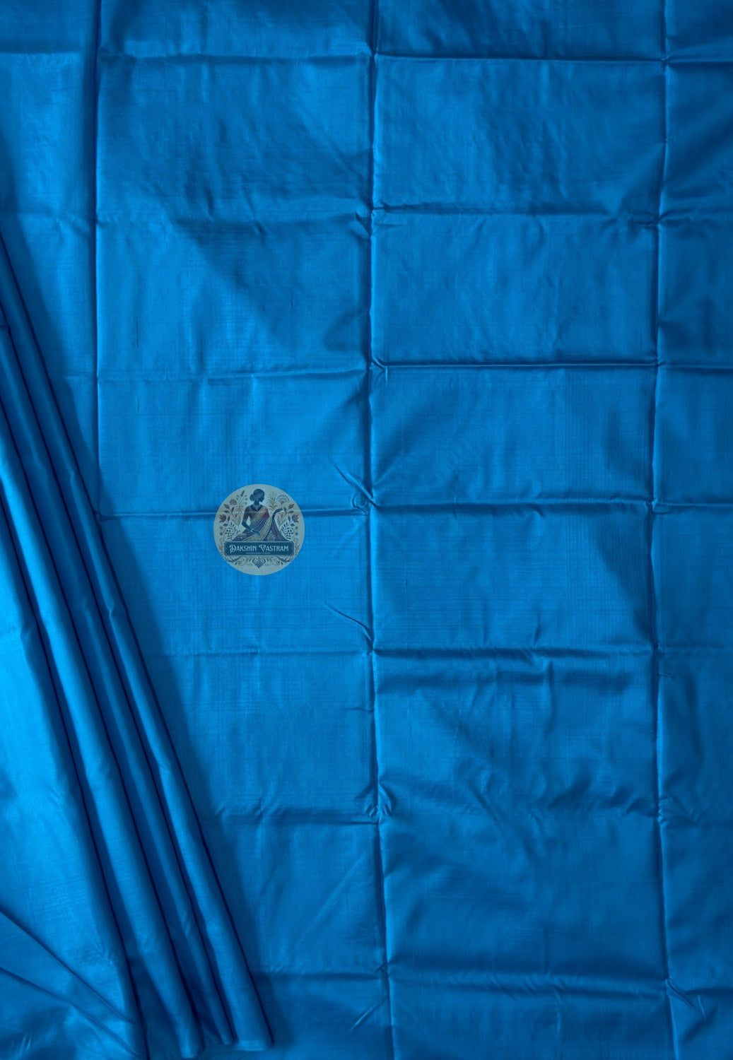 Flat lay of timeless Bishnupur silk than saree – artisan-made pure silk, never mass-produced, delivered across UK