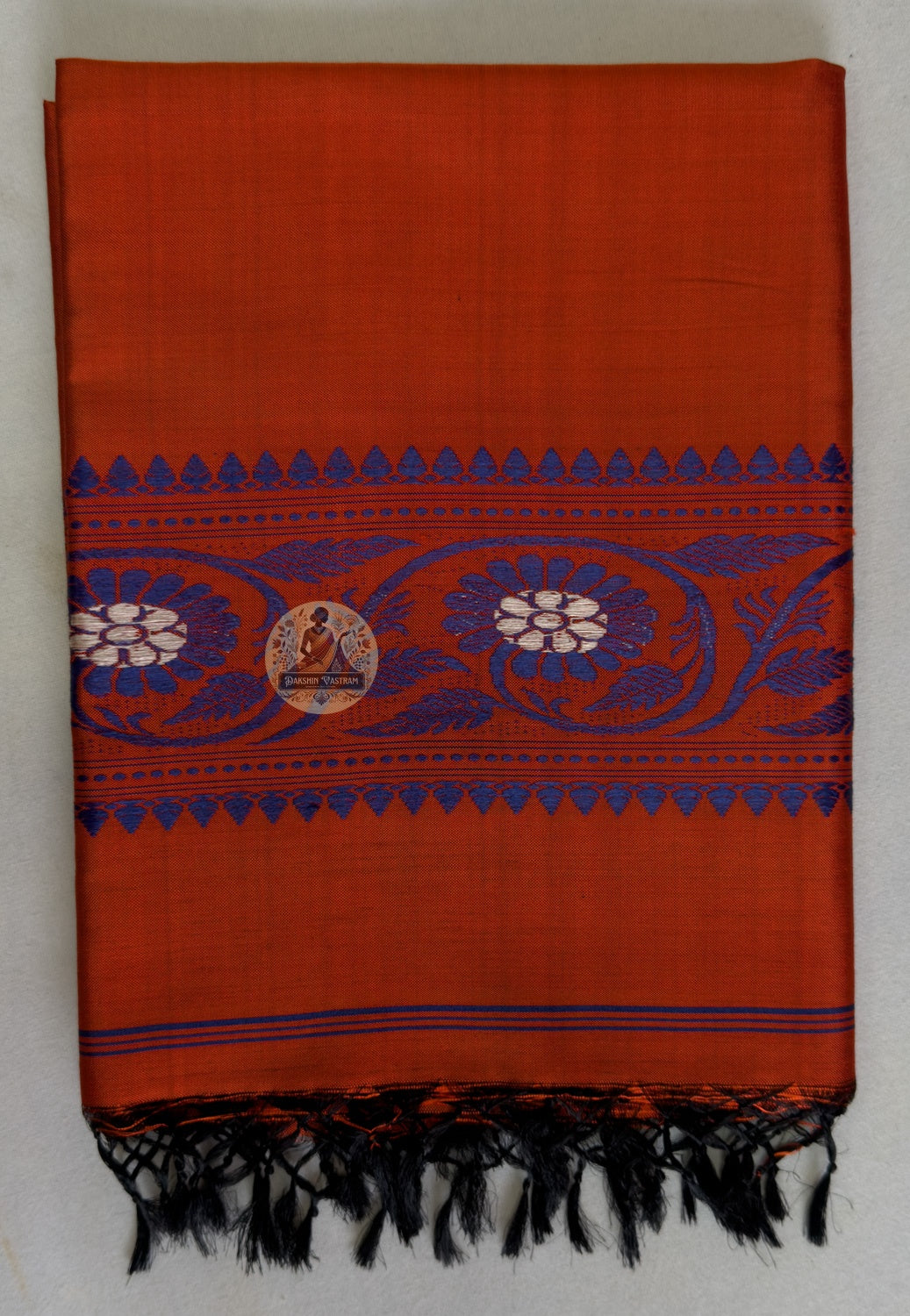 End panel detail of Baluchari pure silk stole – hand-knotted black silk tassels with indigo woven chakra border, authentic Bengal handloom – Dakshin Vastram