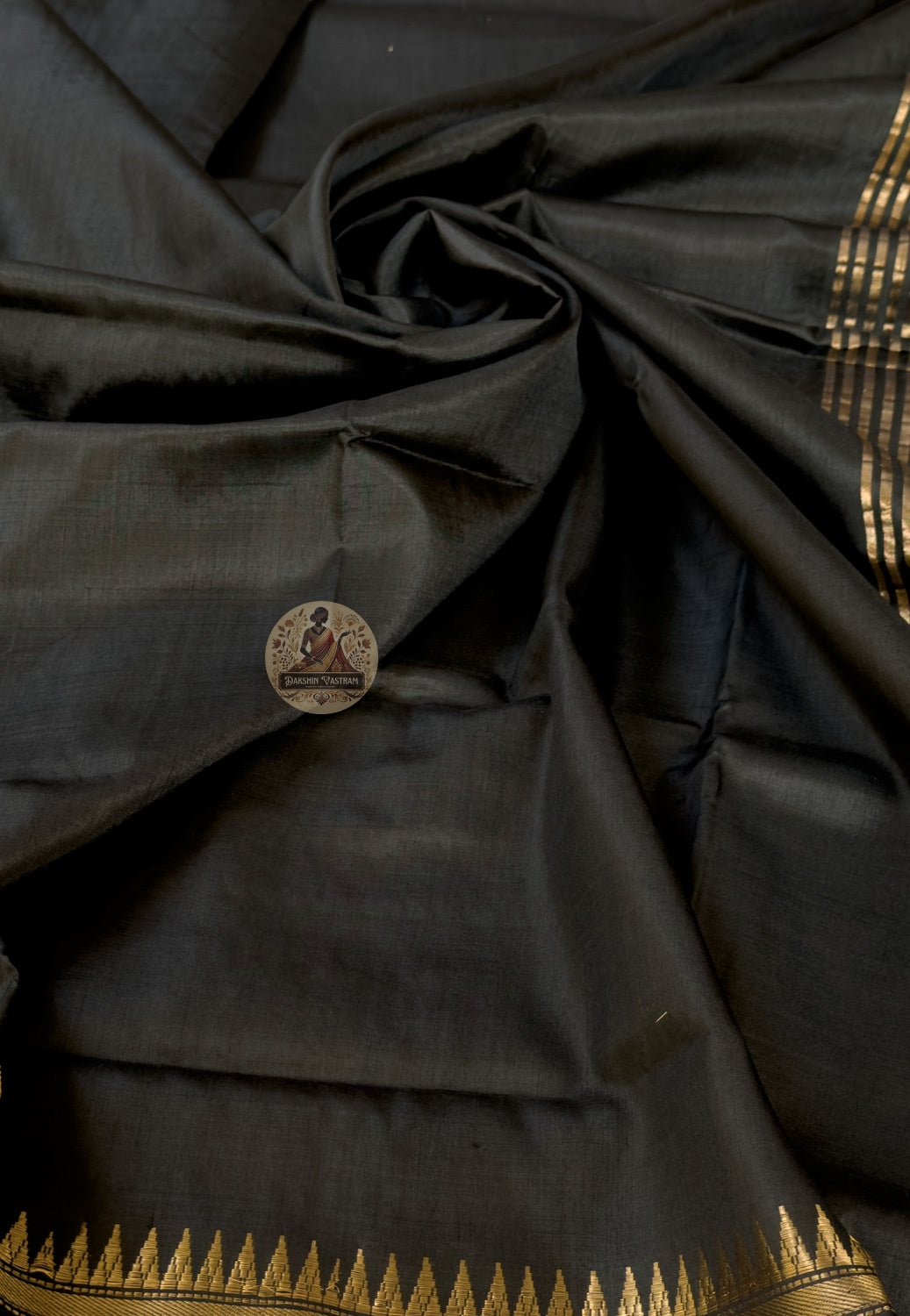 Close-up of pallu of Bishnupur Katan silk saree showing refined woven border and heritage motifs by Bankura artisan weavers
