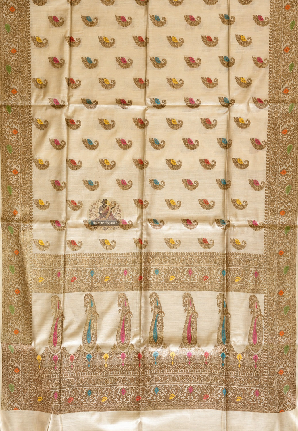 Close-up of pure wild Muga Tussar silk of Banarasi Saree showing naturally golden fibre, dense handwoven Banarasi weave and warm luminous texture that deepens with age