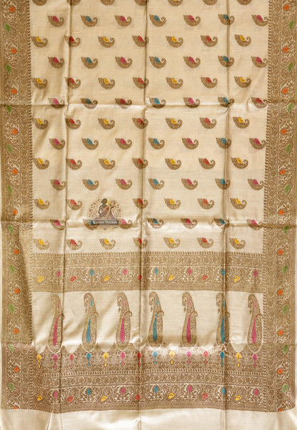 Close-up of pure wild Muga Tussar silk of Banarasi Saree showing naturally golden fibre, dense handwoven Banarasi weave and warm luminous texture that deepens with age