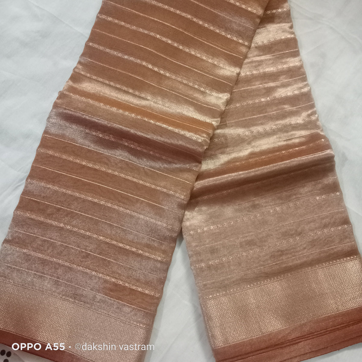 Close-up of Korat Tissue Silk displaying fine organic silk fibers and sophisticated texture