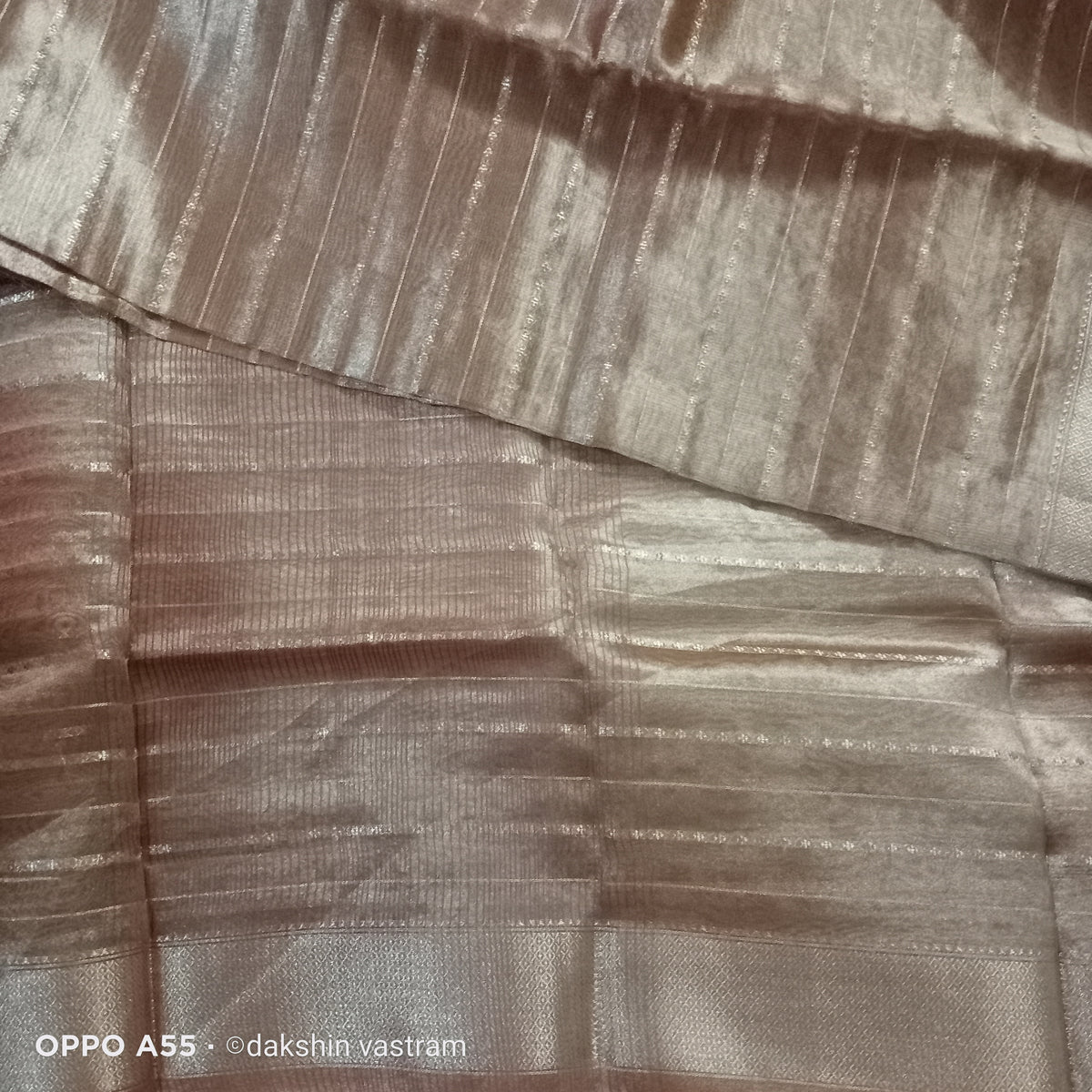 Close-up of Korat Tissue Silk displaying fine organic silk fibers and sophisticated texture