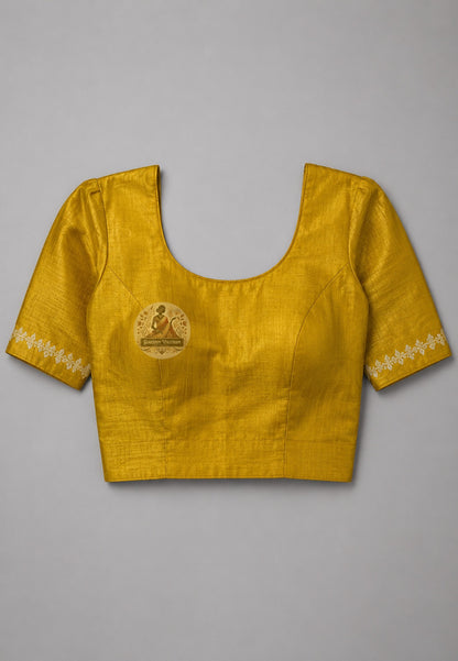 Close-up of Ghicha Tussar Silk blouse fabric in warm golden-brown natural colour, handwoven raw silk texture crafted for Indian festive occasions and family celebrations
