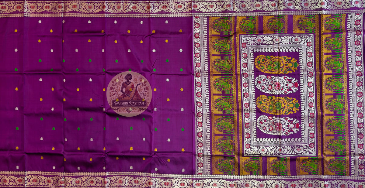 Detailed close-up of hand-woven border on premium Baluchari Silk Saree showing centuries-old terracotta temple-inspired Bishnupur weave patterns in pure Bengal silk, crafted with the patience of devotion