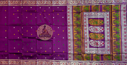 Detailed close-up of hand-woven border on premium Baluchari Silk Saree showing centuries-old terracotta temple-inspired Bishnupur weave patterns in pure Bengal silk, crafted with the patience of devotion