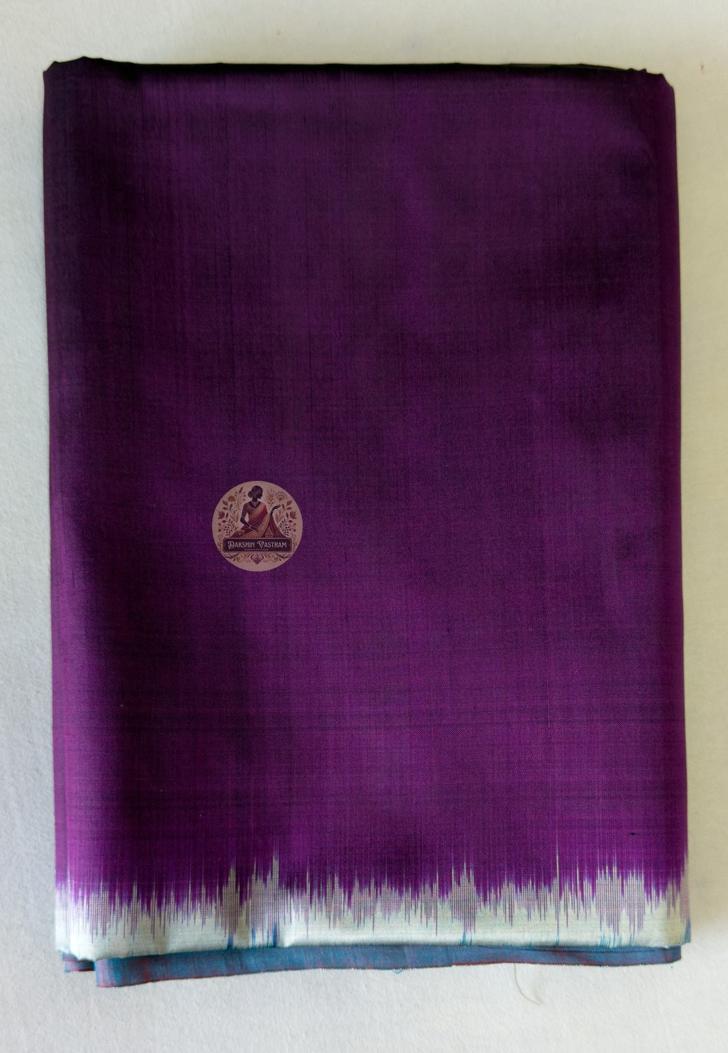 Detail shot of Bishnupur Katan Silk Saree pleats and drape, capturing the celebratory weight and effortless elegance of authentic handwoven pure silk from Bengal