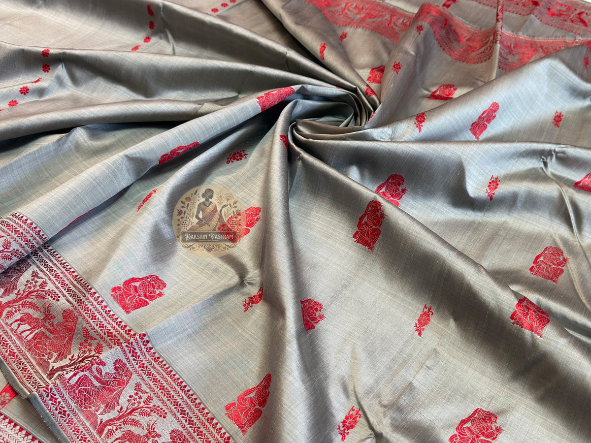 Lustrous Baluchari silk saree in moss green with figurative weave panels and heritage West Bengal craftsmanship