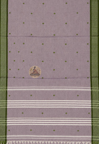 Close-up of pure cotton saree weave showing fine handloom texture and breathable fabric quality