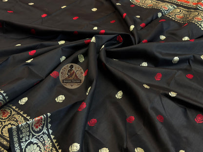 Traditional handloom Baluchari saree in terracotta with hand-woven narrative motifs and ivory contrast pallu