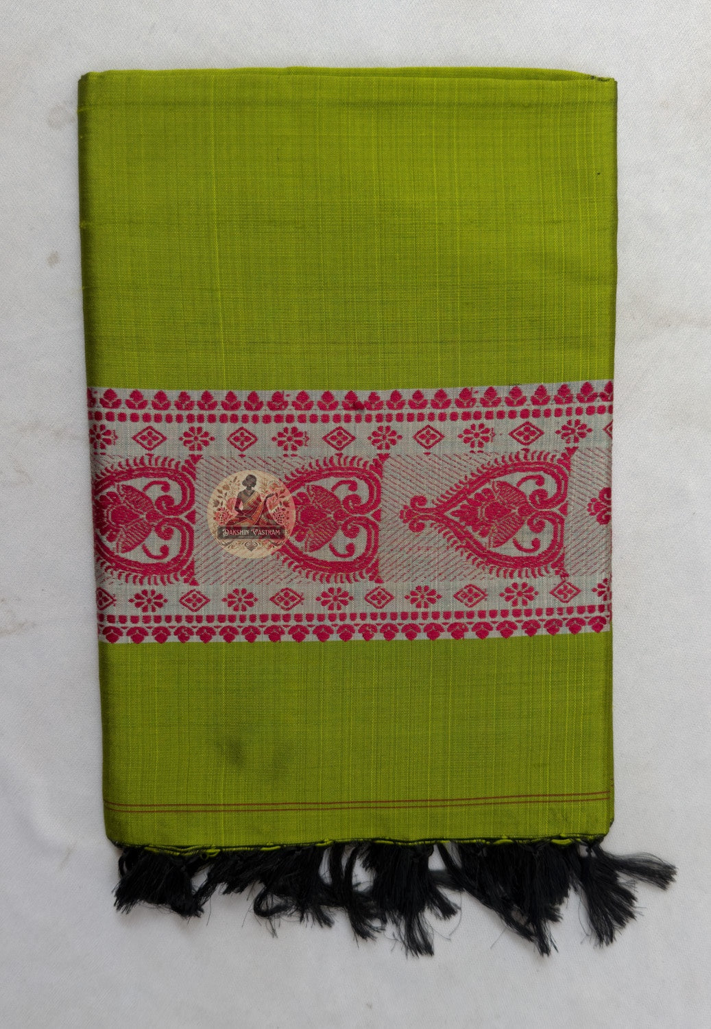 Close-up of Bishnupur Baluchari silk stole weave showing finely rendered mythological figures and geometric border woven directly into pure silk thread