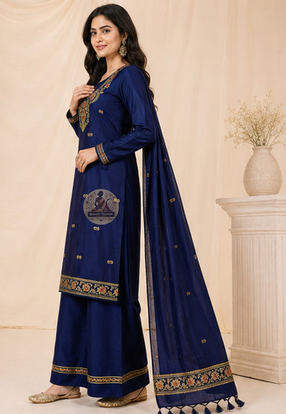 Close-up of Resham silk threadwork woven into neckline of deep blue Baluchari kurti fabric — pit-loom craft from Bishnupur