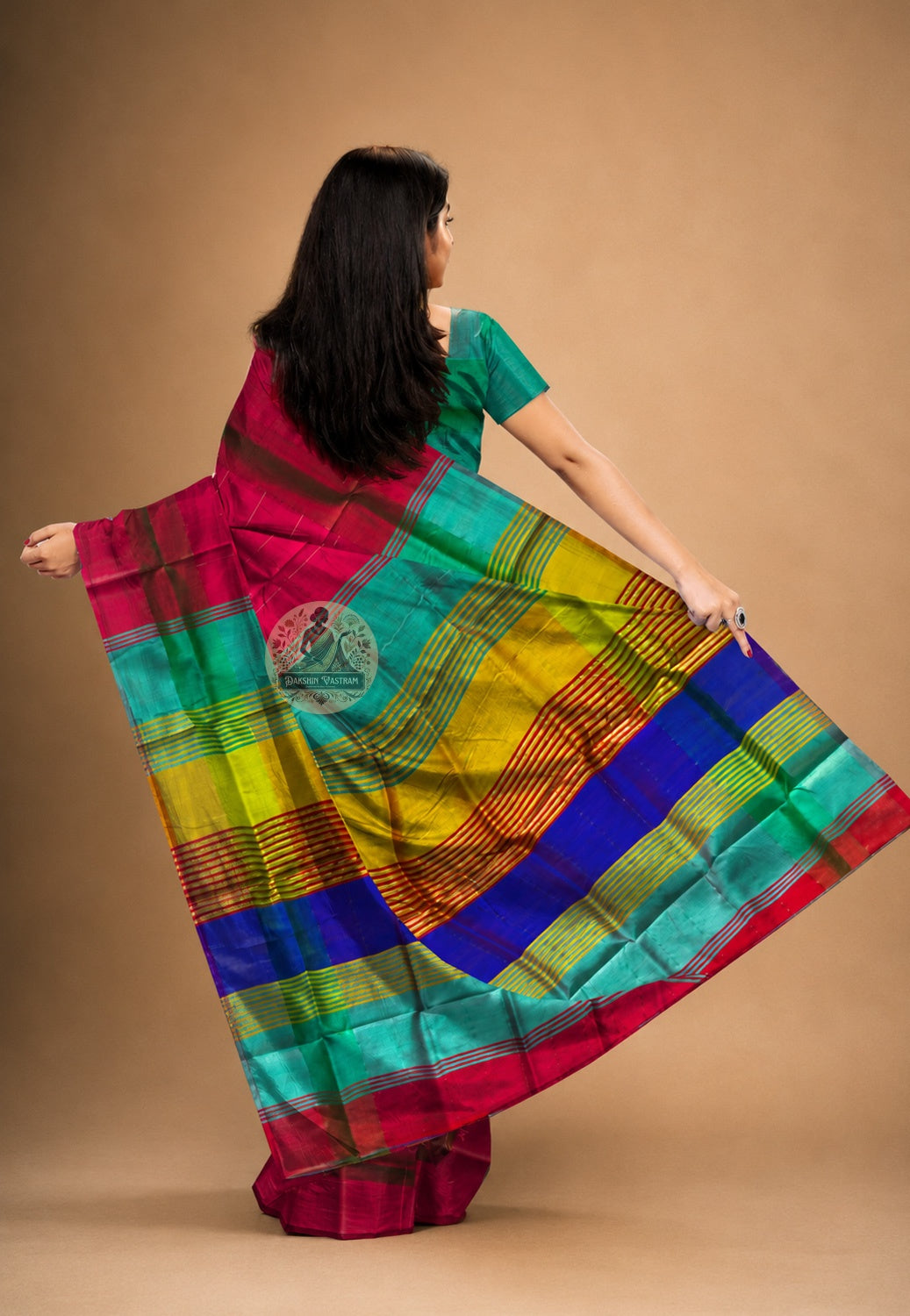 Rear view of handwoven Bishnupur Katan Silk Saree displaying the richly woven pallu with traditional Bengal terracotta temple and folk-inspired motifs in pure silk