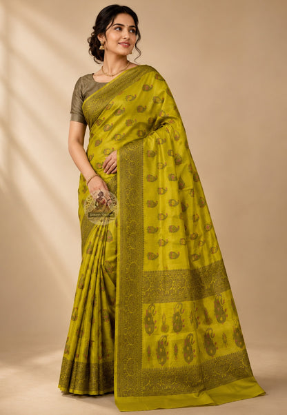Front view of Banarasi Muga Tussar Saree in naturally golden Muga silk with intricate Banarasi zari border, draped for wedding and festive celebrations across India