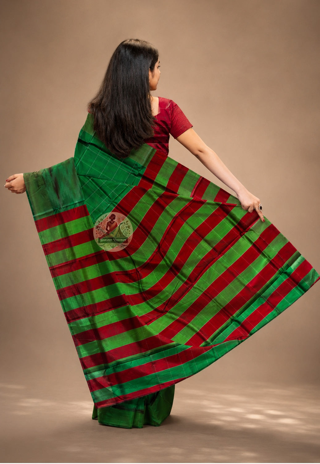 Rear view of handwoven Bishnupur Katan Silk Saree displaying the richly woven pallu with traditional Bengal folk and temple-inspired motifs in pure silk