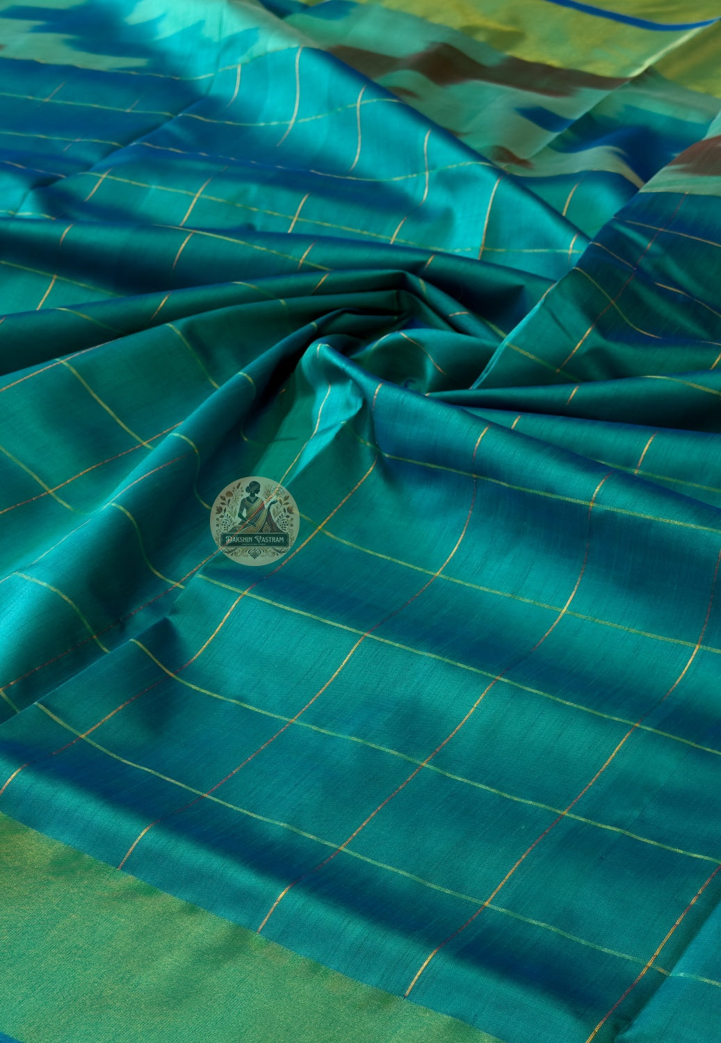 Macro close-up of handwoven motifs on Bishnupur Katan Silk Saree, revealing intricate Bengal heritage patterns woven into the pure mulberry silk — a depth that goes beyond what the eye can see