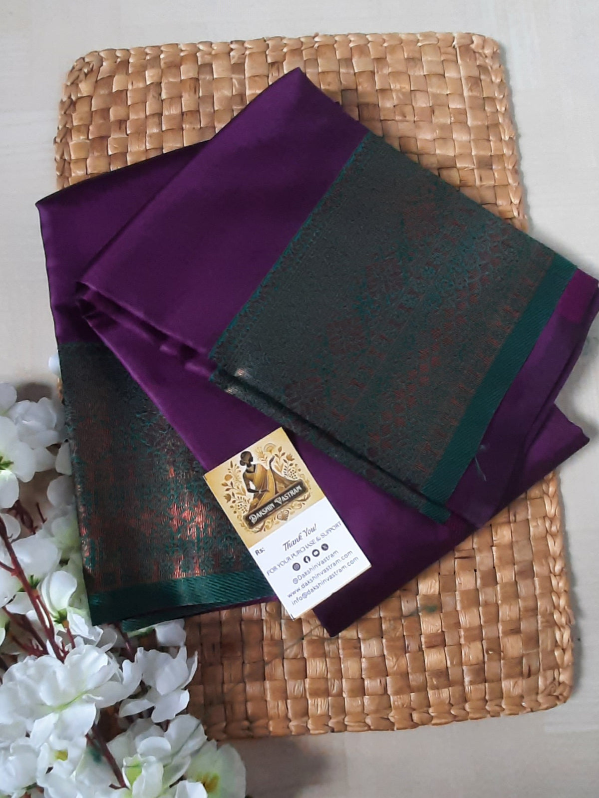 Saree Rear View: Rear view highlighting the elegant drape and fine texture of the Mow Silk Saree.