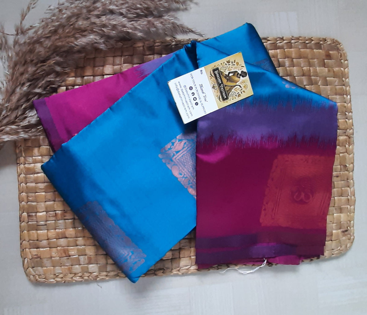 Back view highlighting the luxurious drape and smooth fabric of the Soft Art Silk Saree.