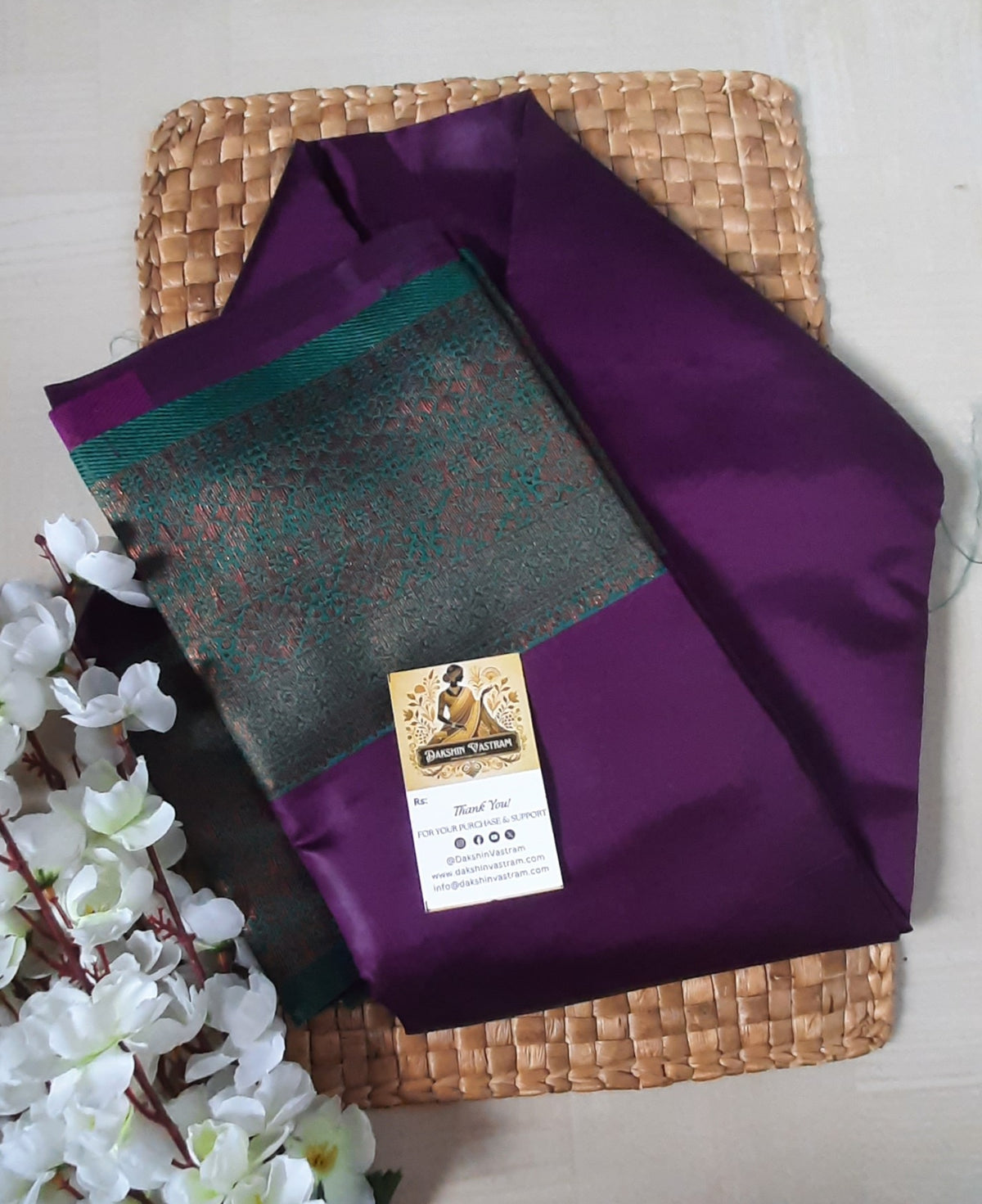 Side profile of the Mow Silk Saree draped gracefully with a lustrous, timeless shine.